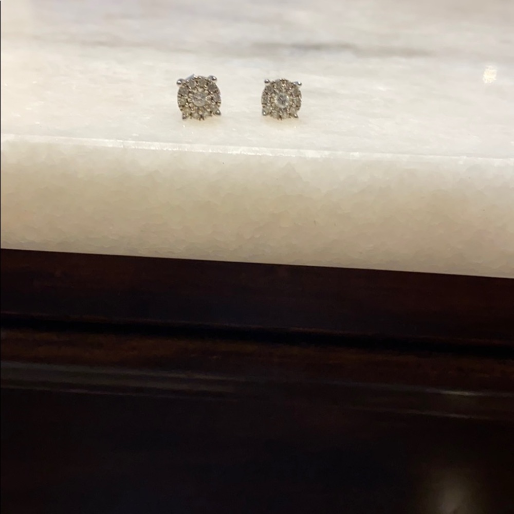 NOT FOR SALE 14 k white gold diamond earrings.